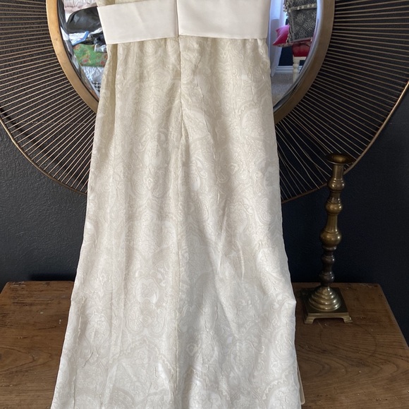 Custom made ivory tone on tone sleeveless dress with satin ruffle and bow. - Picture 7 of 7